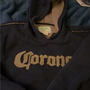 Cropped Corona Blue and Tan Sweatshirts with Graphic Designs